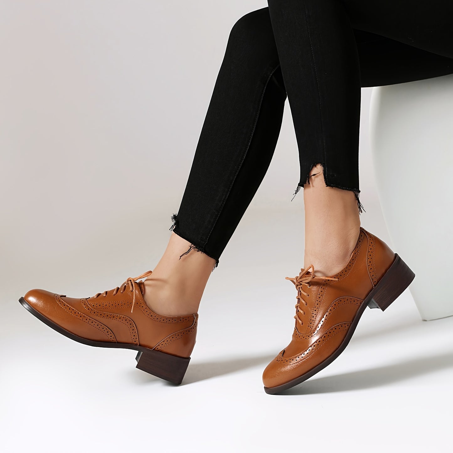 EROCALLI Perforated Retro Wingtip Brogue Pumps for Women